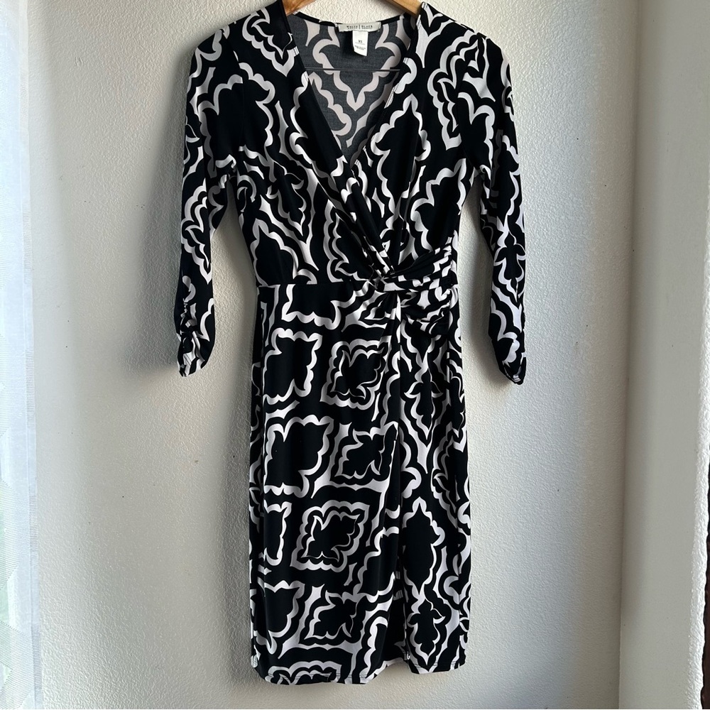 White House Black Market | Black and White Patterned Faux Wrap Mini Dress - Picture 2 of 8